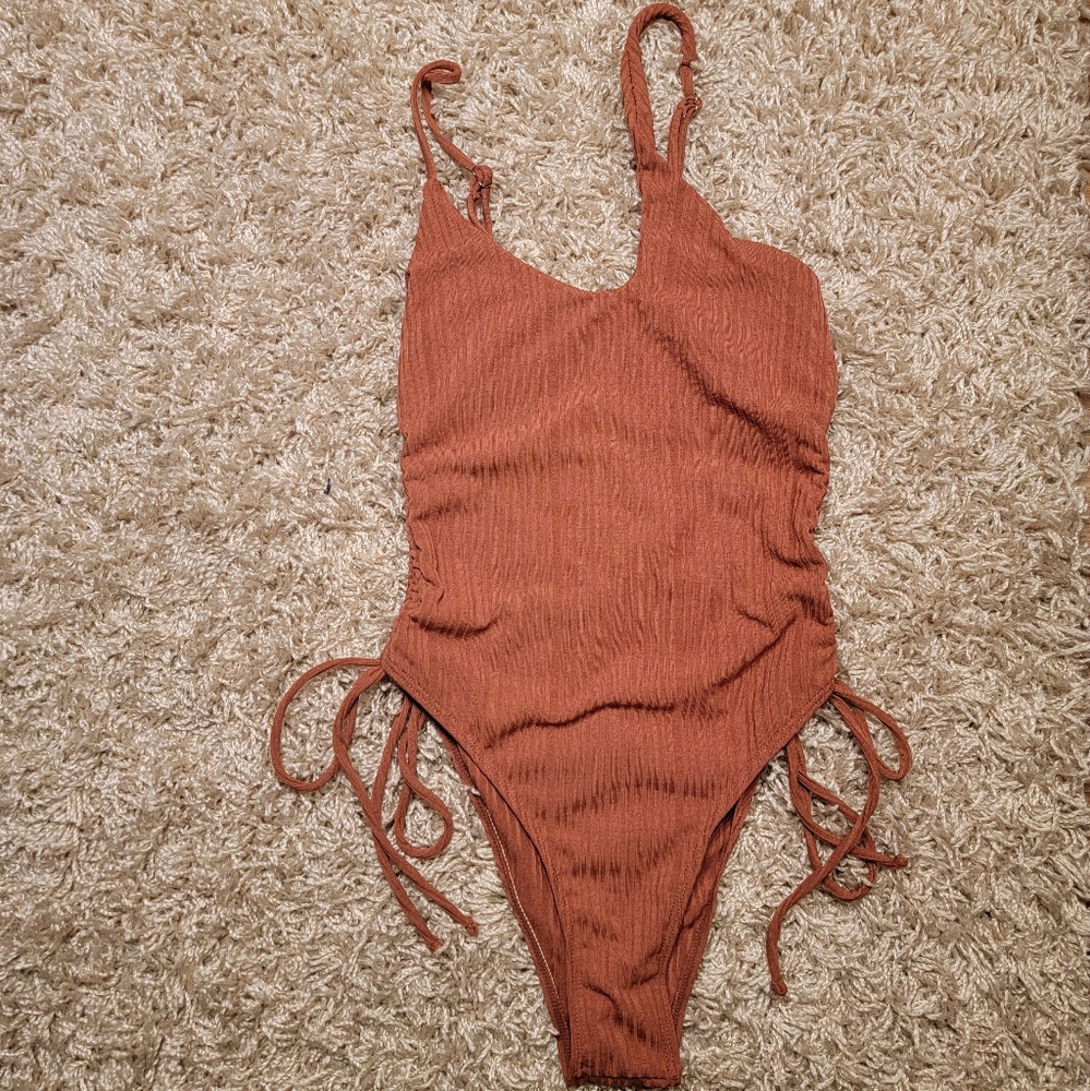 Swimsuit with off-balance neckline